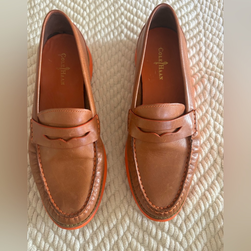 Cole Haan Monroe Penny loafers in tan leather with an orange sole- size 6.5